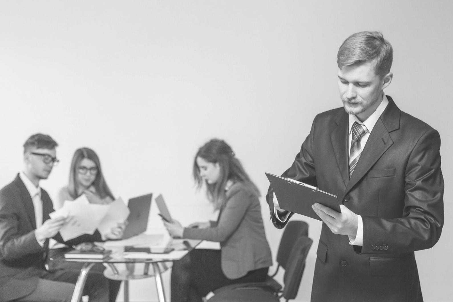 Professional workspace showing financial planning materials and documents